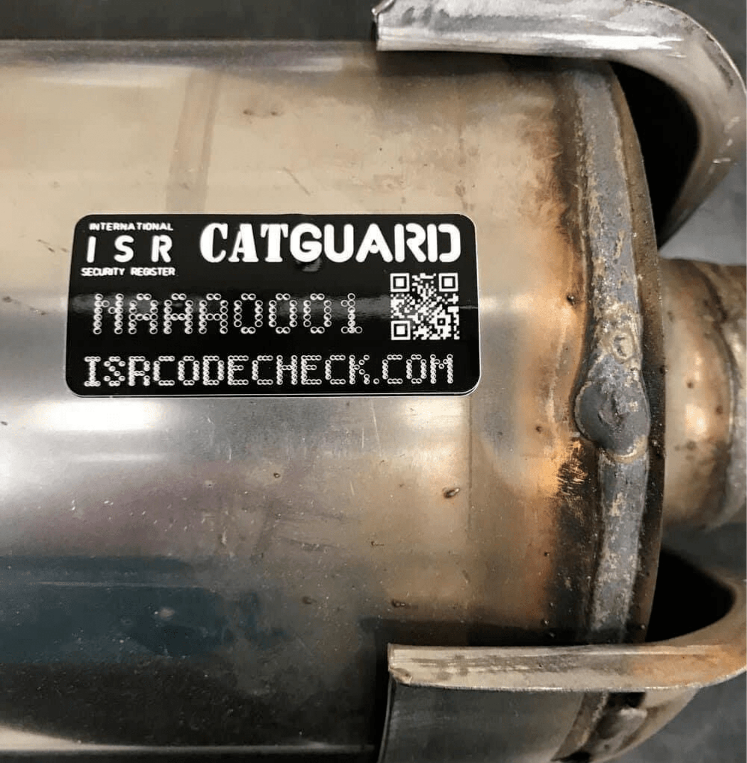Photo of catalytic converter with anti-theft label